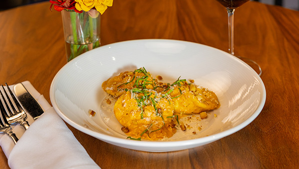 Plate of smoked goat cheese tortellacci. 