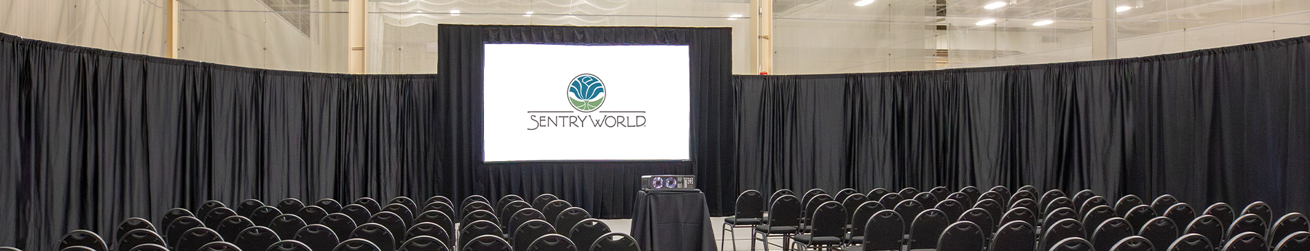 SentryWorld Fieldhouse set up for a corporate meeting