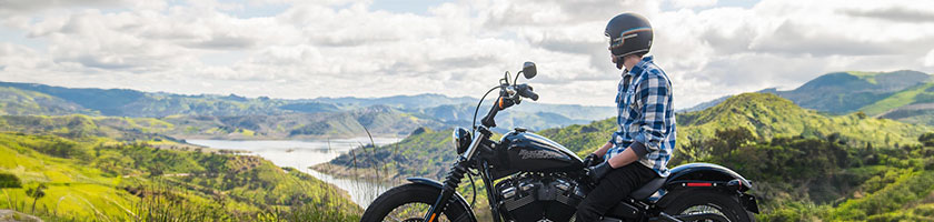 Motorcyclist looking at a beautiful view