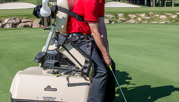 Player using a handicap accessible golf cart at SentryWorld