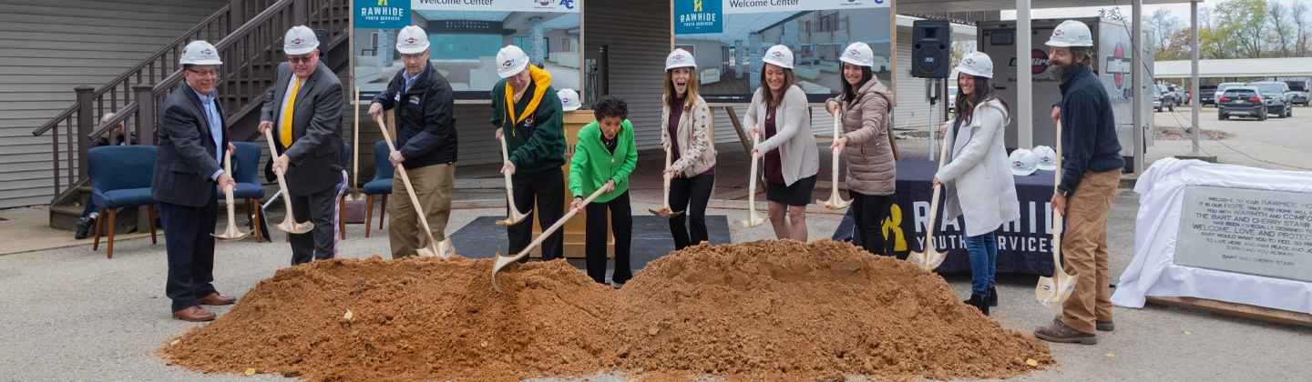 Group of people participating in a groundbreaking