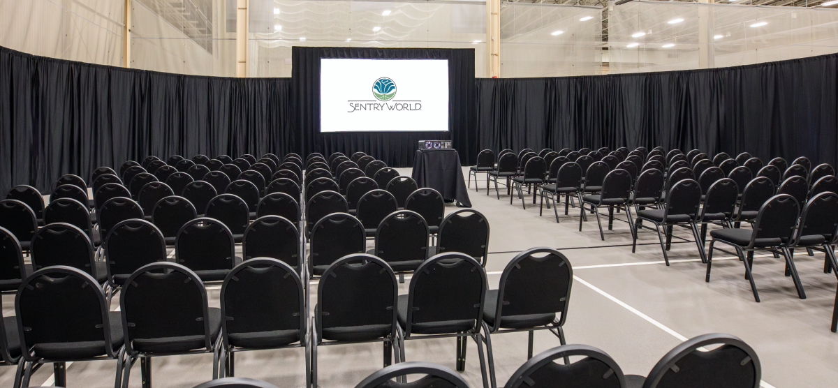 carousel-corporate-event-spaces-2-1200x556 Chairs set in rows for a presentation in the Fieldhouse.