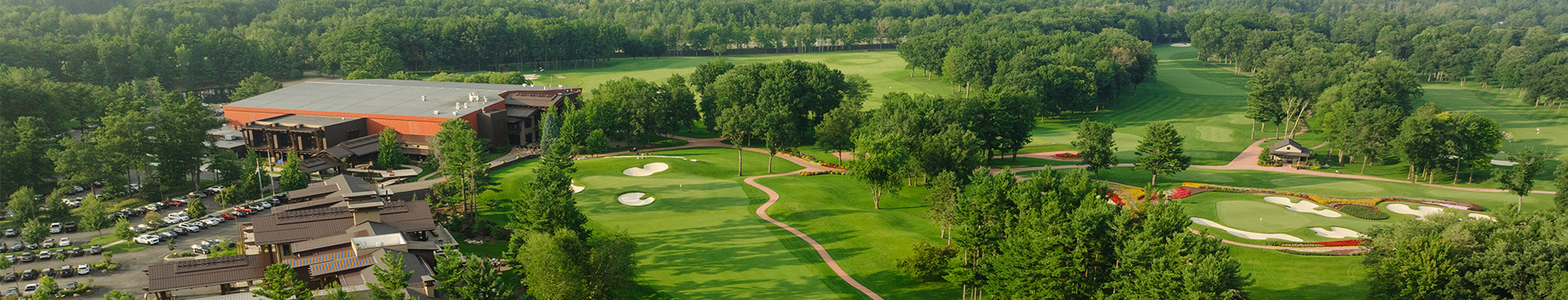 SentryWorld property from above showing The Inn and holes 18 and 16 of the golf course.