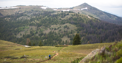 Dirt bike rider on mountain trail