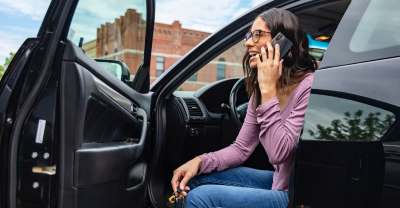 Woman on car inside car