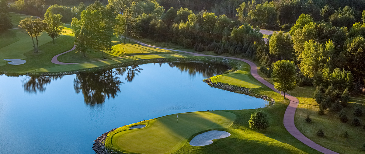 Aerial view of a water hole at the SentryWorld golf course