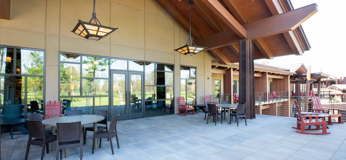 Executive level balcony with chairs and rocking chairs. 