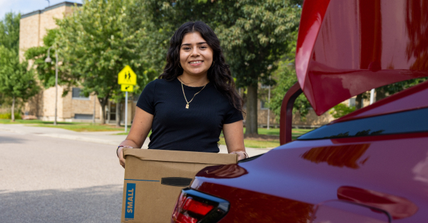 College student unloading car