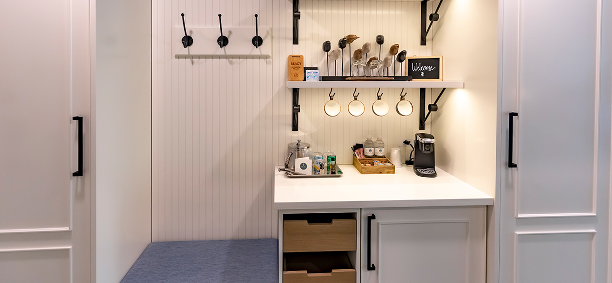 carousel-suite-golf-view-queen-3-1200x556 Suite coffee and mini fridge area.