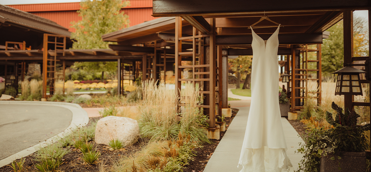 Wedding dress hanging in the archway along The Inn at SentryWorld