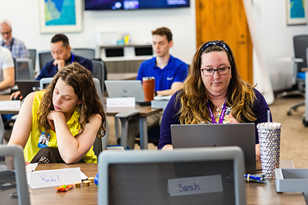 Sentry associates attending a class at Sentry University