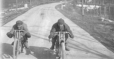 Black and white images with two motorcycle riders