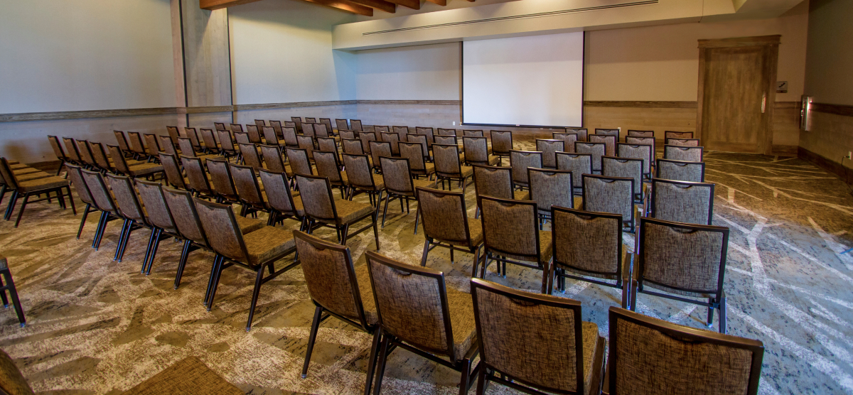 carousel-corporate-event-spaces-3-1200x556 Chairs set in the Grand Hall for a presentation.