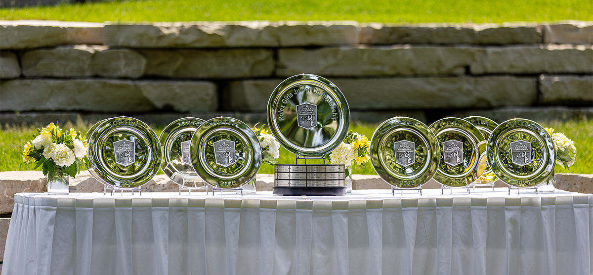 2025 Rolex Girls Junior Championship awards displayed on a table. 