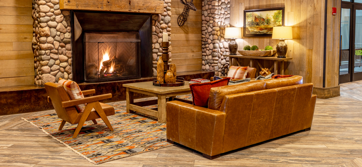 carousel-meeting-services-property-1200x556-02 Fireplace in front entrance at SentryWorld.