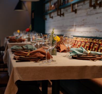 card-stay-dine-396x364 Table is set for dinner at The Library at The Inn.