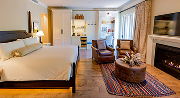 Bed and lounge area in the Executive Suite at the Inn at SentryWorld