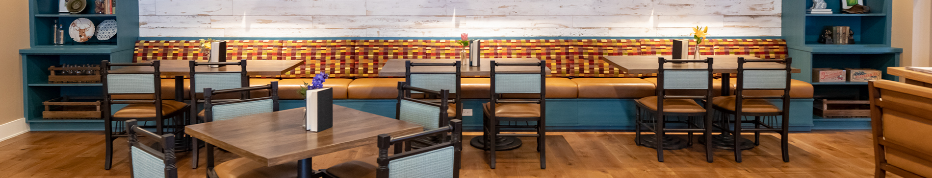 Booth and tables for dining at the Library Café