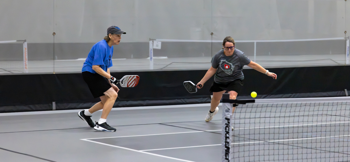 carousel-fall-league-signup-pickleball-2-1200x556 Players play pickleball at the SentryWorld fieldhouse.