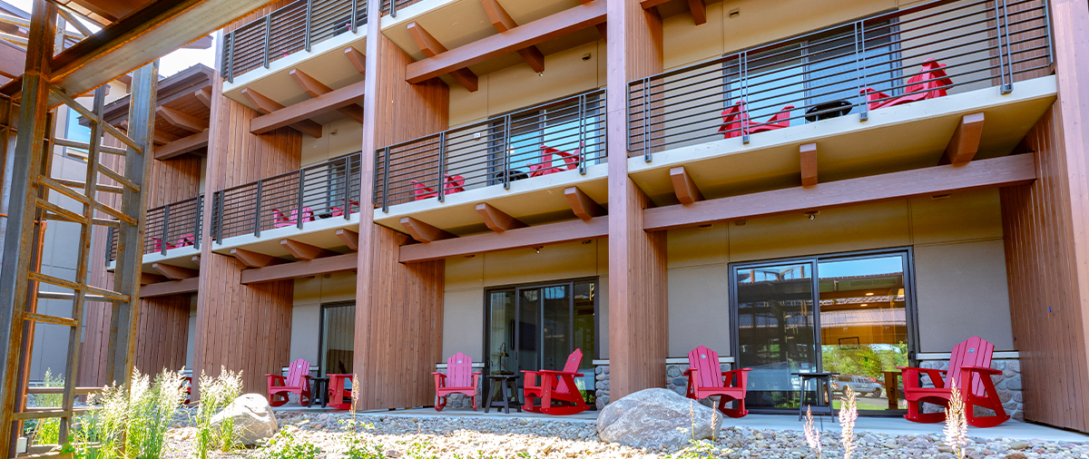 Balconies with red chairs at The Inn at SentryWorld