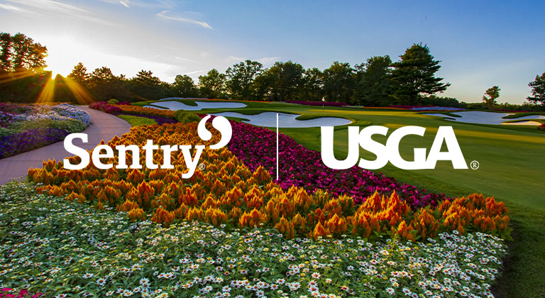 Sentryworld Golf course flower hole with the Sentry and USGA logos