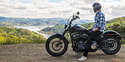 Motorcyclist looking at a beautiful view