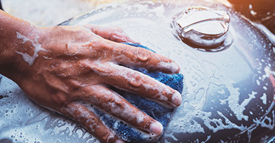 Hand washing a motorcycle