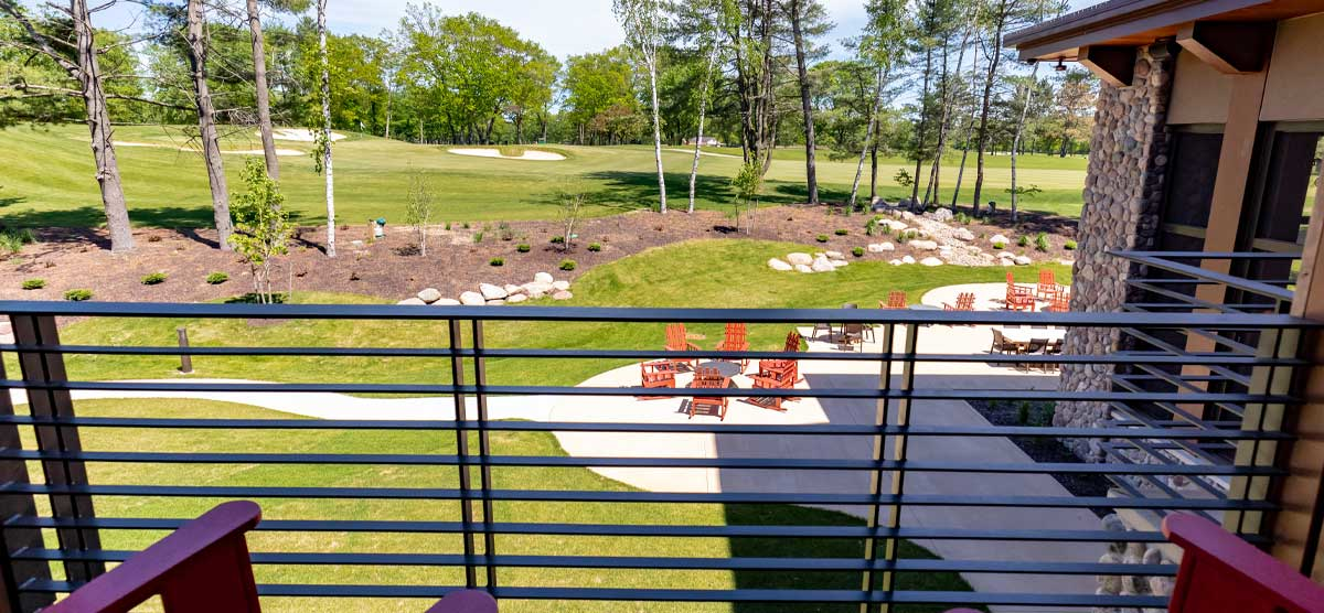 Golf course view from a balcony in The Inn at SentryWorld