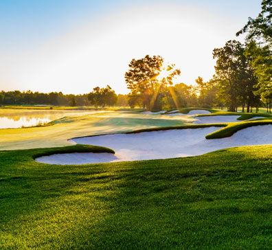 Sand traps next to a putting green on the SentryWorld golf course