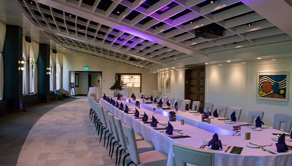 Gallery room with a long table for a meeting at Muse