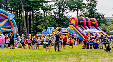 Associates attending a summer celebration for Sentry families.