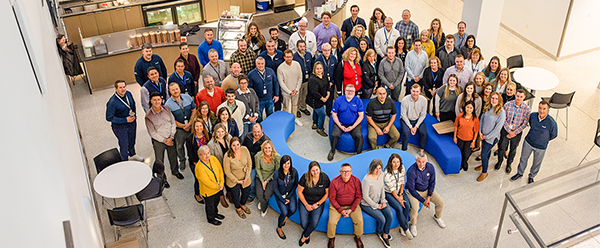 Sentry associates sitting on quote couches