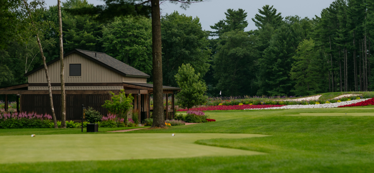 Hole tee area with refreshment station in the distance. 