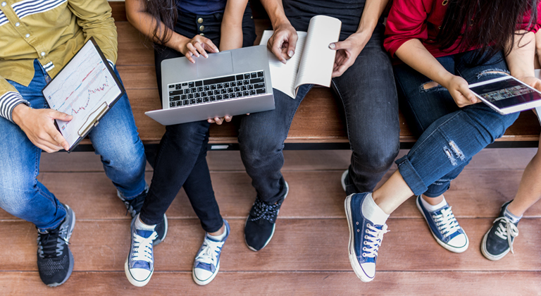 Four students studying together