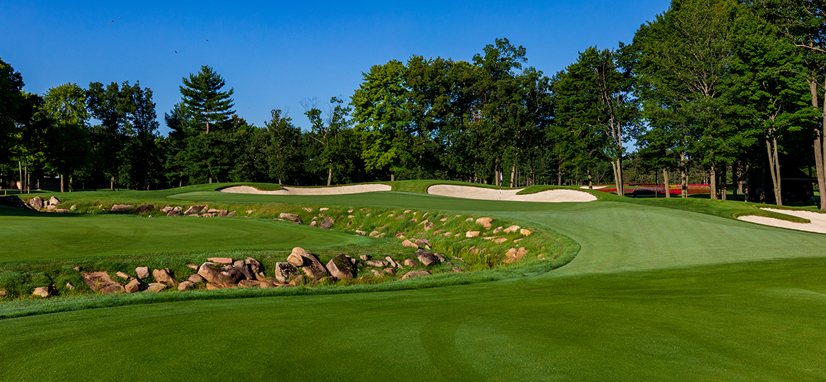 Water hazard and sand traps off the ninth hole fairway at SentryWorld