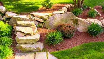 Landscaping of rocks and bushes