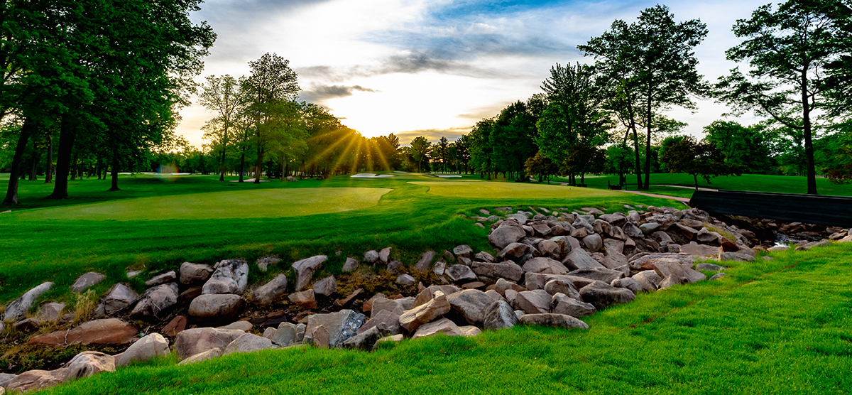 Rock and water hazard on the seventh hole at SentryWorld