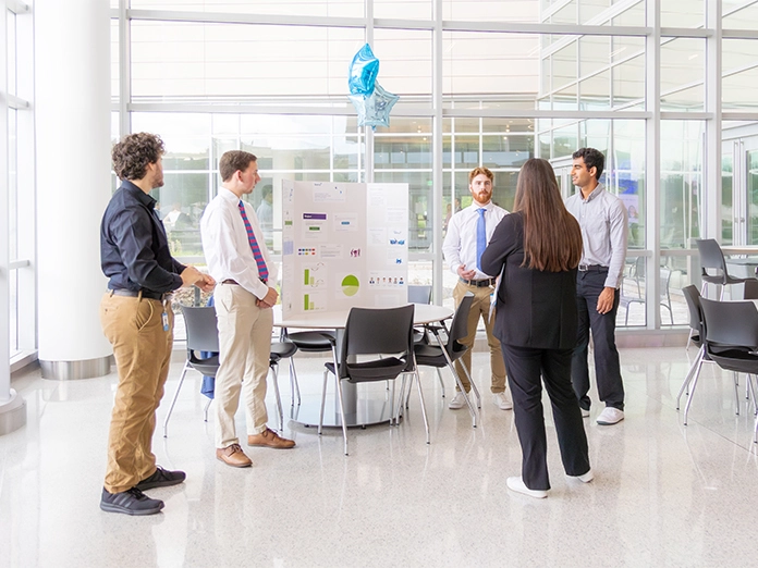 internships-case-competition-696x522 Interns presenting during a case competition