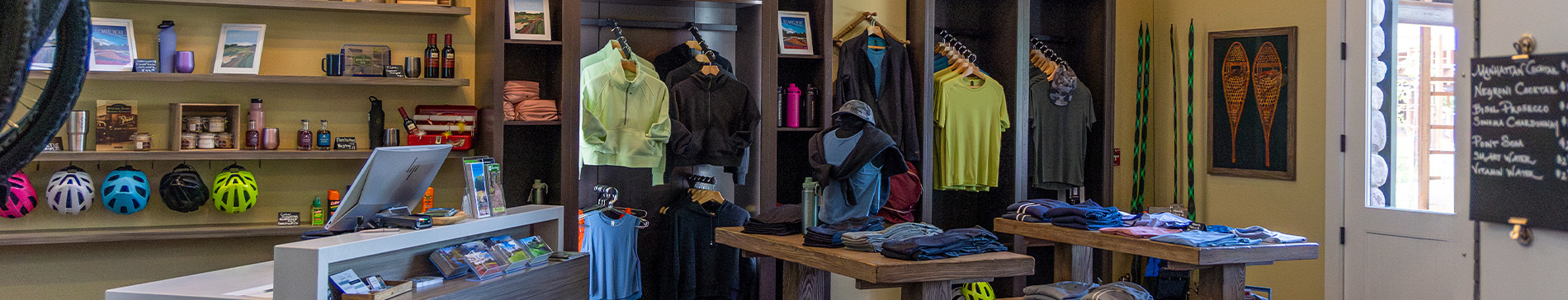 hero-lodging-amenities-1900x364 The Inn pro shop clothing display.