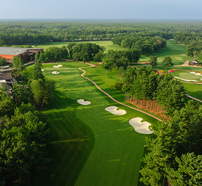 SentryWorld property from above showing The Inn and holes 18 and 16 of the golf course.
