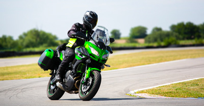 Person turning on motorcycle