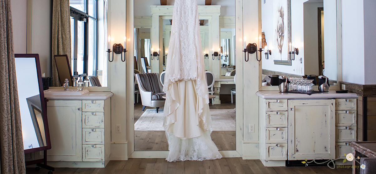 Wedding dress hanging in the salon at SentryWorld