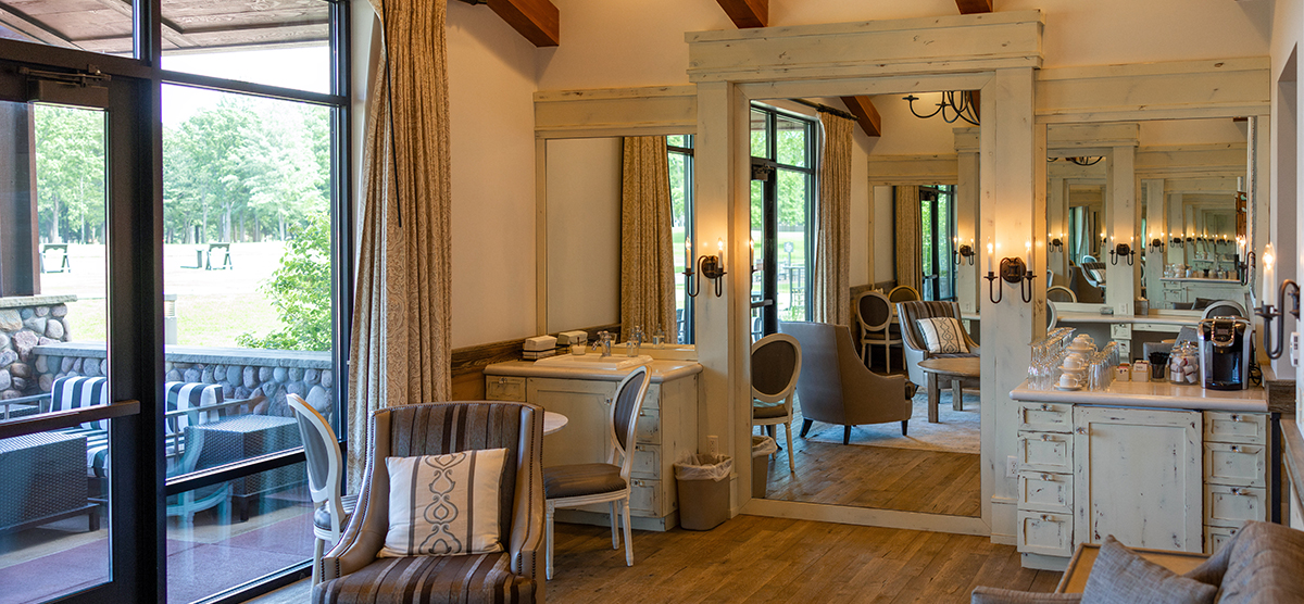 carousel-wedding-venue-salon-sw-1-1200x556 Salon room with mirrors and getting ready area along with an outdoor patio.