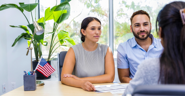 Couple in office with insurance agent