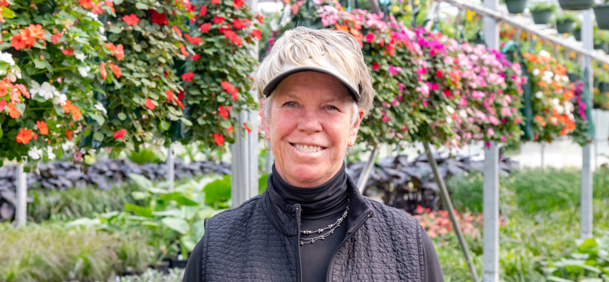 carousel-heath-farms-1-1200x556 Heidi Heath headshot in greenhouse.