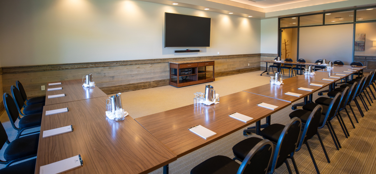carousel-corporate-event-spaces-6-1200x556 Tables set in the Community Room for a meeting.