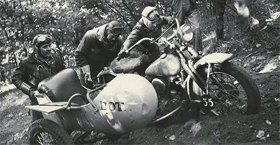 Harley-Davidson motorcycle with sidecar on a trail