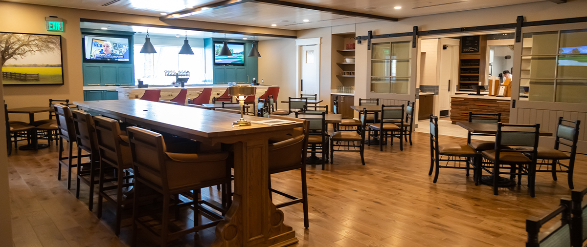 Bar and table seating in the Library Cafe at The Inn