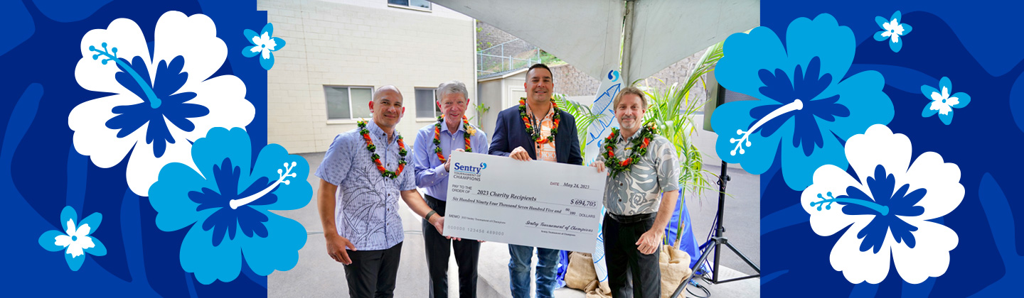 Sentry CEO Pete McPartland gives donation check to local organizations in Maui