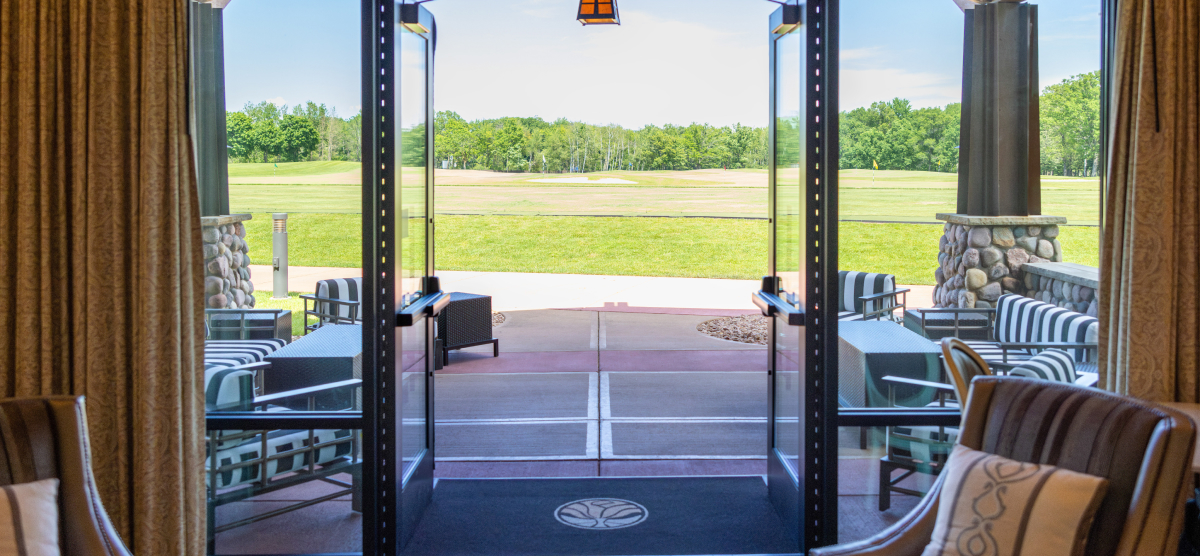 Doors open to the outdoor patio seating area. 